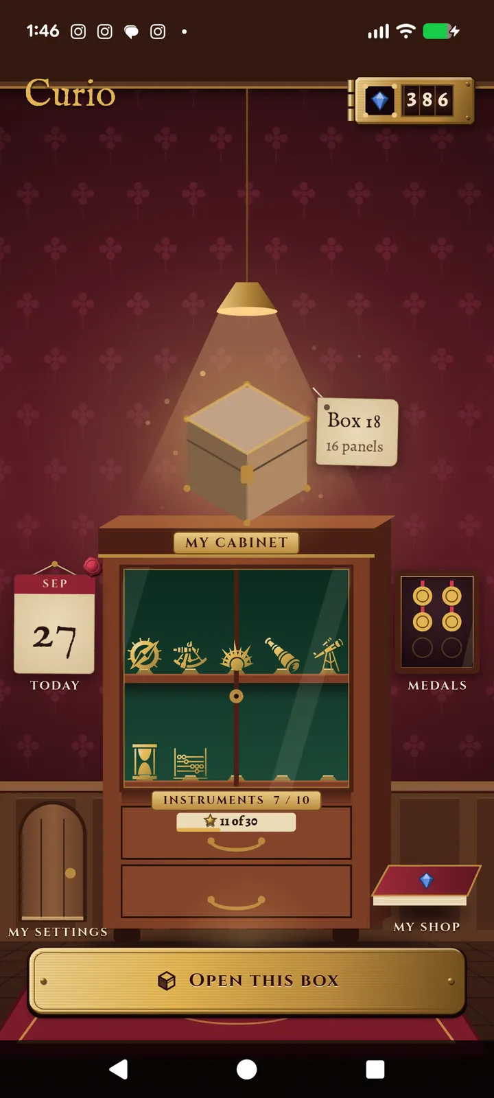 Curio cabinet with a lit shelf of curios and an Open this box button on a real phone